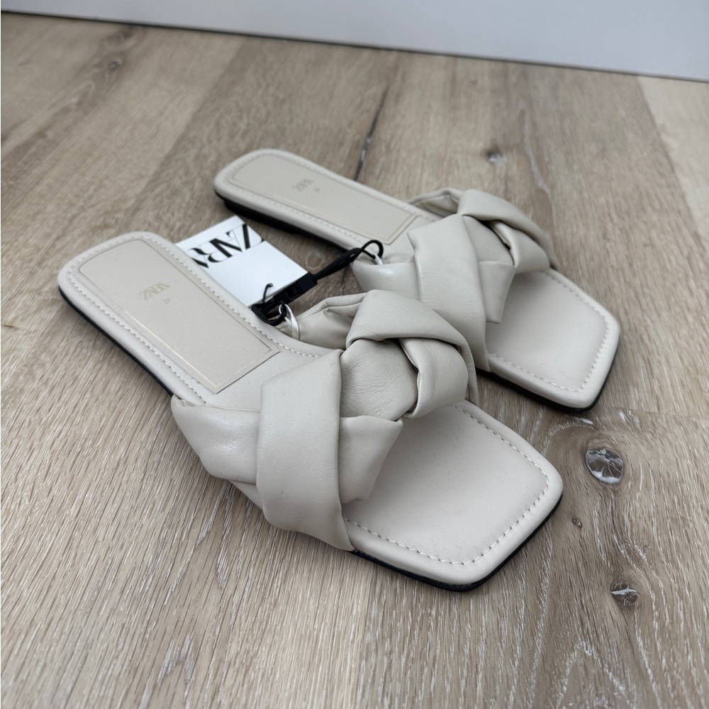 Woven flat leather sandals